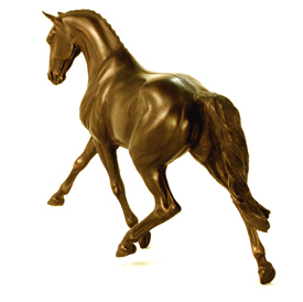 cold cast bronze of a  half passing thoroughbred 